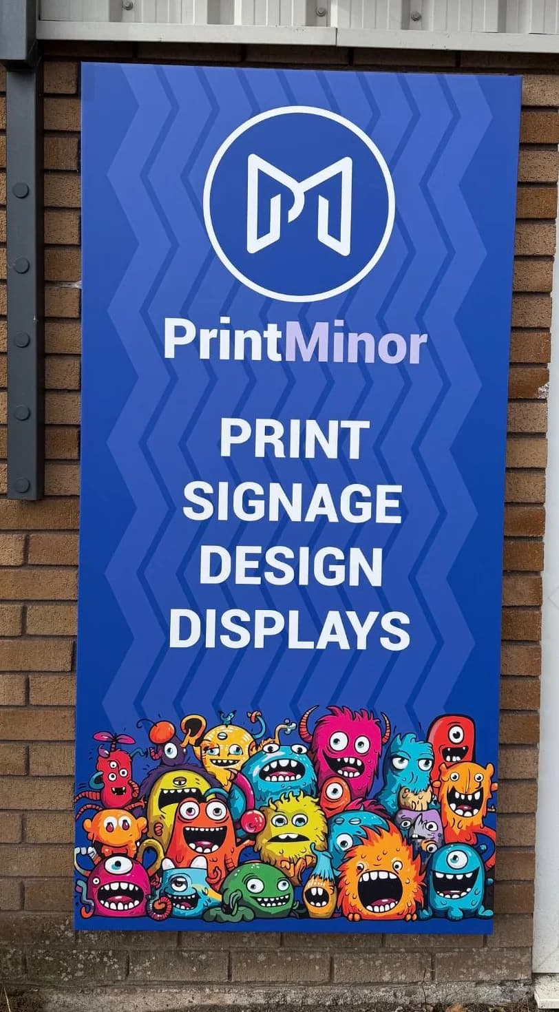 The blue PrintMinor sign outside Unit 3, Gwel Avon Business Park, Saltash: print, signage, design, displays