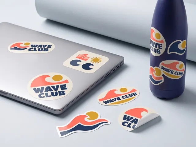 Wave Club decal stickers on a laptop and a water bottle