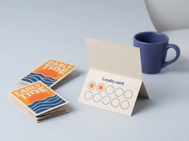 Early Tide folded cards, one open to show a loyalty stamp grid